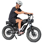 Person riding an electric bike with speed information displayed