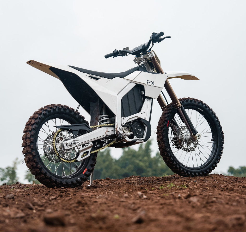 Rerode RX Midsize Dirt Bike Rear Side View Outdoor Background