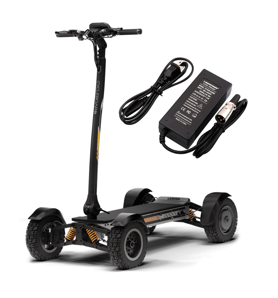Black electric scooter with charging cable and adapter on a white background
